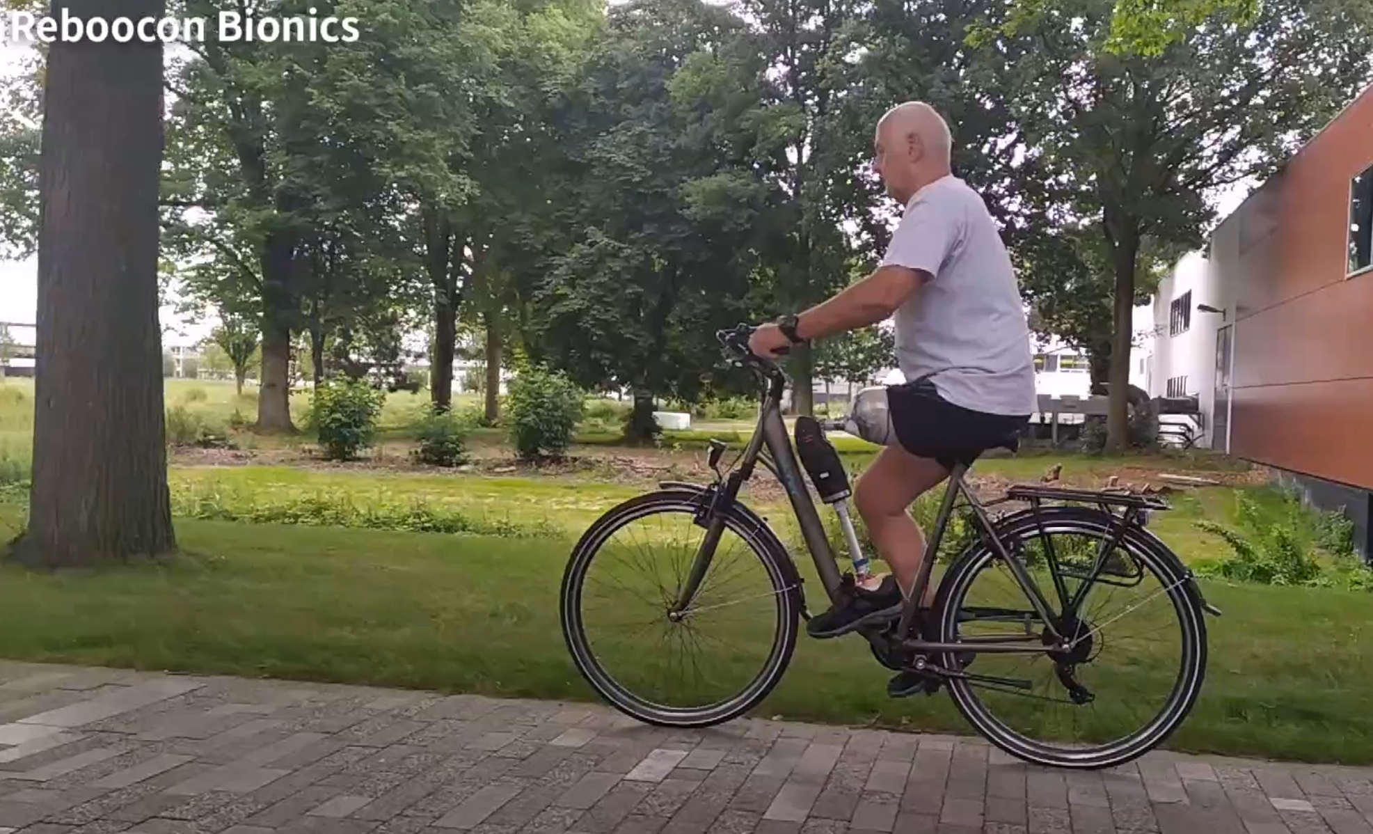 Cycling around with a powered knee prosthesis