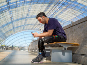 Mr. Cetindag sitting down in Leipzig Messe with Intuy Knee